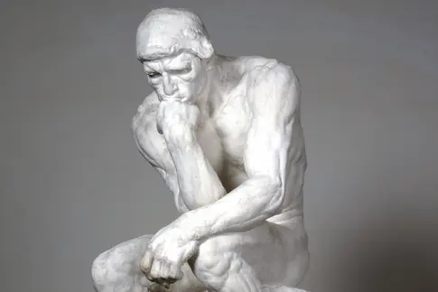 Auguste Rodin, Der Denker, 1881-83 Skulptur eines sitzenden Mannes, Hand am Kinn