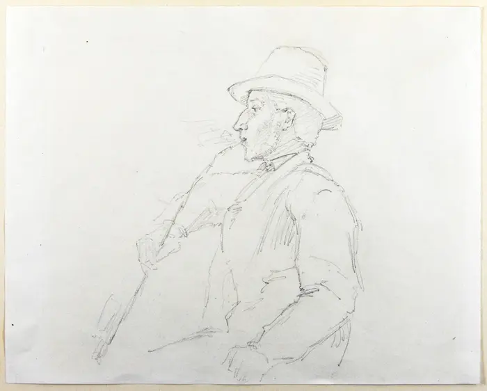 Ein Mann raucht eine Pfeife