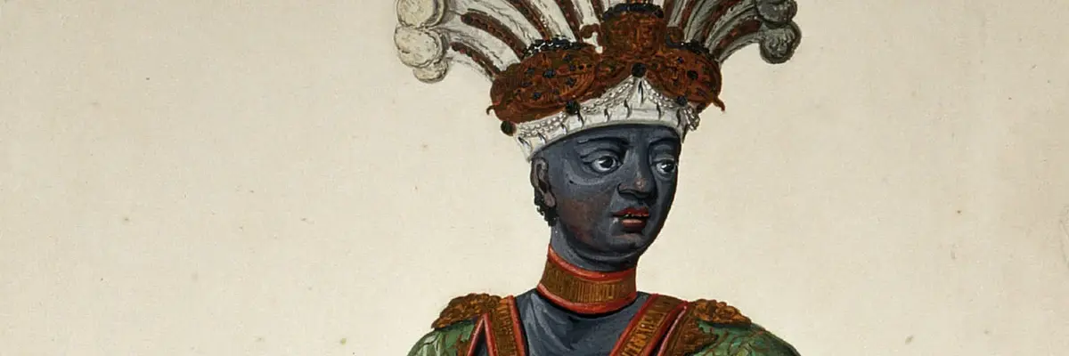 August der Starke, dunkel angemalt, in Gewand und mit Federschmuck auf dem Kopf