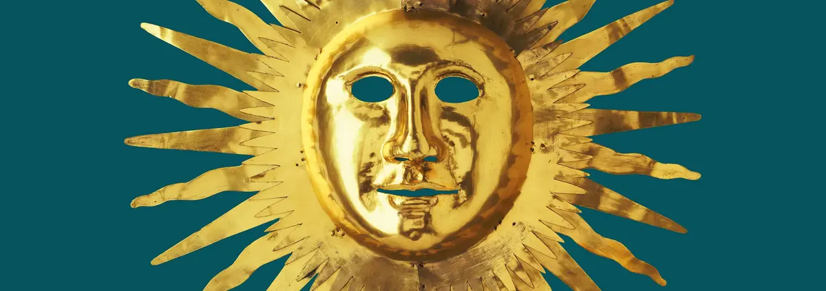 goldene Maske in Form einer Sonne
