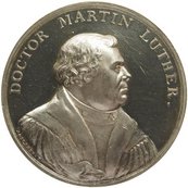 Medaille, darauf seitliches Portrait von Luther