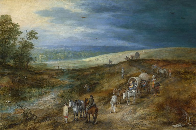 Hügelige Landschaft mit einer Gruppe an Menschen